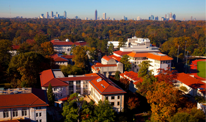 Aerial view of Emory University campus with Atlanta skyline in the background